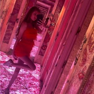 EGO orange feather skirt and bandeau set